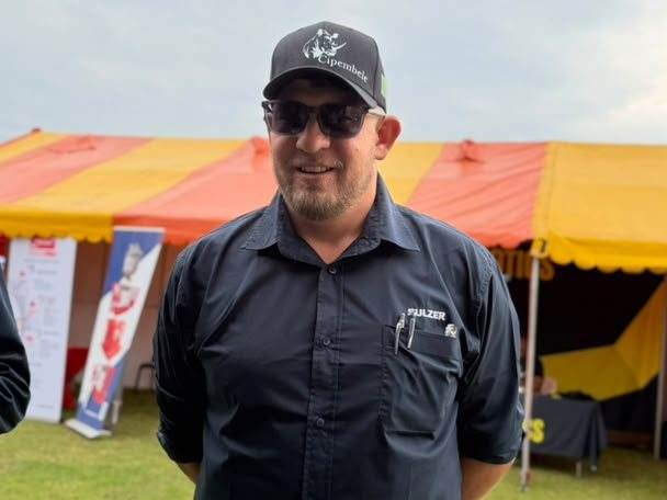 A visitor wearing a Cipembele cap at the MTE Kansanshi expo