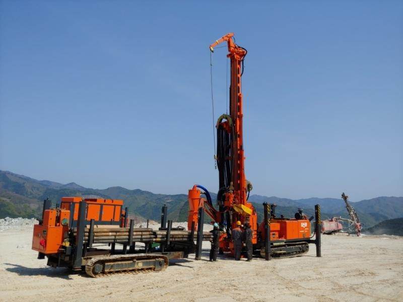 Hanjin D&B-30 Multi deep-hole multipurpose drill rig with its mast raised and rod carrier alongside (manufacturer photo)