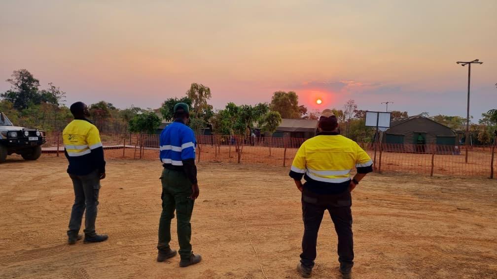 Crew at sunset on camp